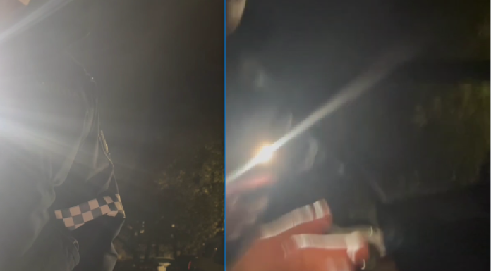 (video) „Explicați de ce îmi cereți actele?!”: Un polițist a încearcat să smulgă telefonul unui șofer, care stătea parcat și căruia i-a cerut documentele